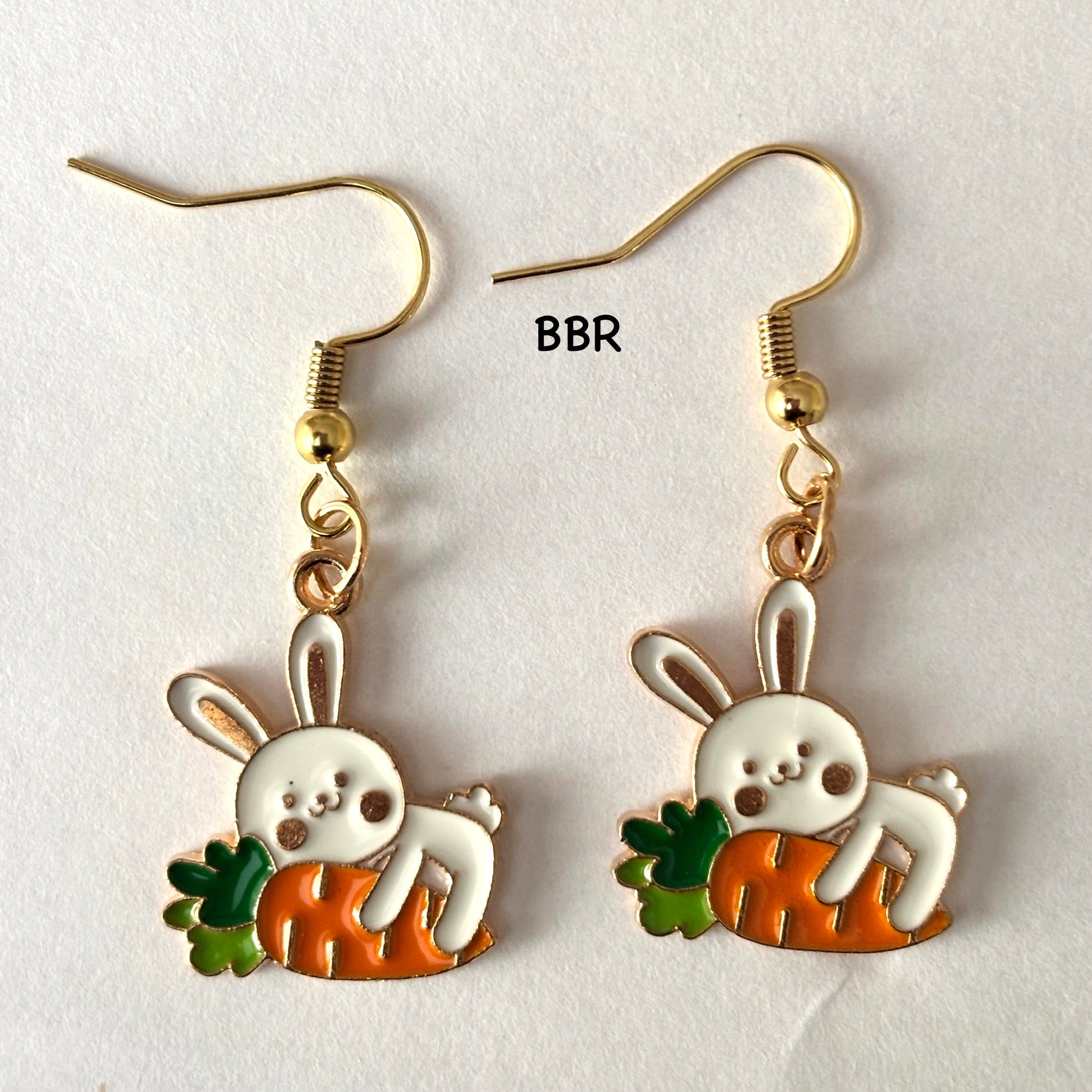 Bunny-shaped earrings with a carrot